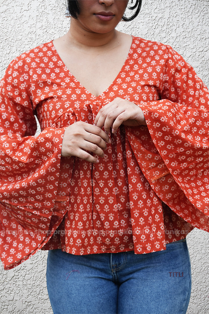 TITLI! Bell Sleeve Low Neck Peplum Top